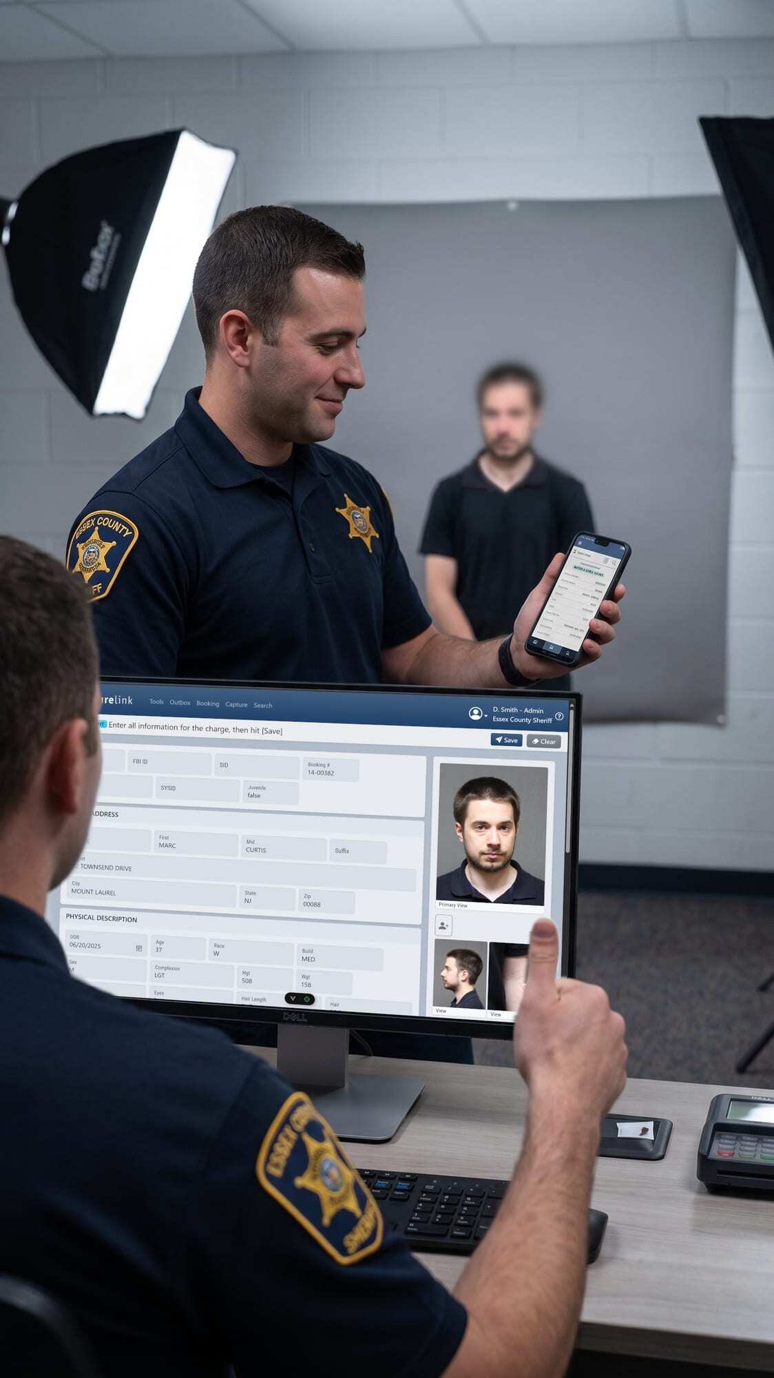 Officers using CorreTrak and PictureLink